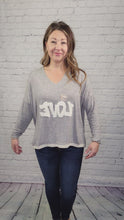Load and play video in Gallery viewer, Love V-Neck Sweater
